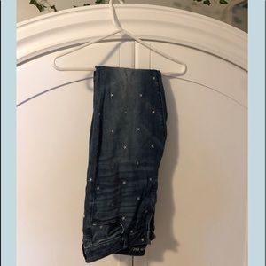 High waisted jeans with star embroidery